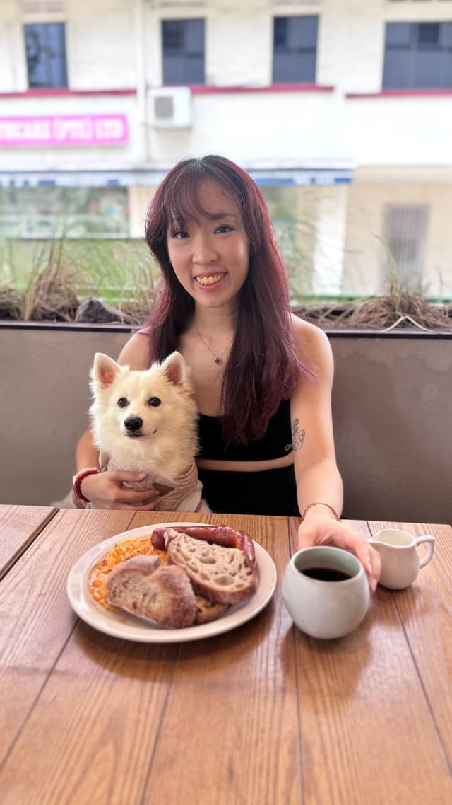 pawwhere hero image lady with japanese spitz